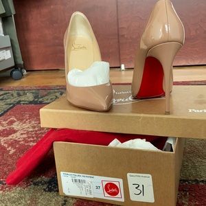 Nude Christian Louis Vuitton heals, classic pump that never goes out of style.
